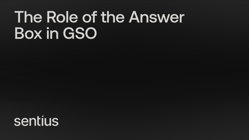Laptop screen showing an AI assistant direct answer box with cited sources